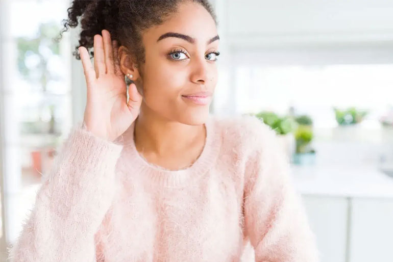 What Ringing in Your Left Ear Means Spiritually, According to Experts