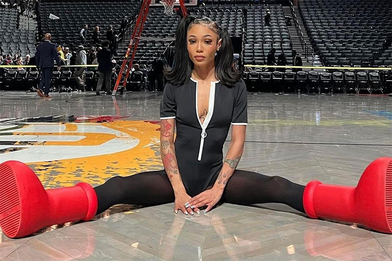 Coi Leray big red boots